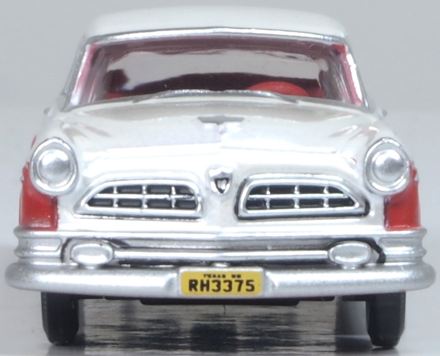 Model of the 1955 Chrysler New Yorker Deluxe Coupe St. Regis Tango Red/Platinum by Oxford at 1:87 scale.