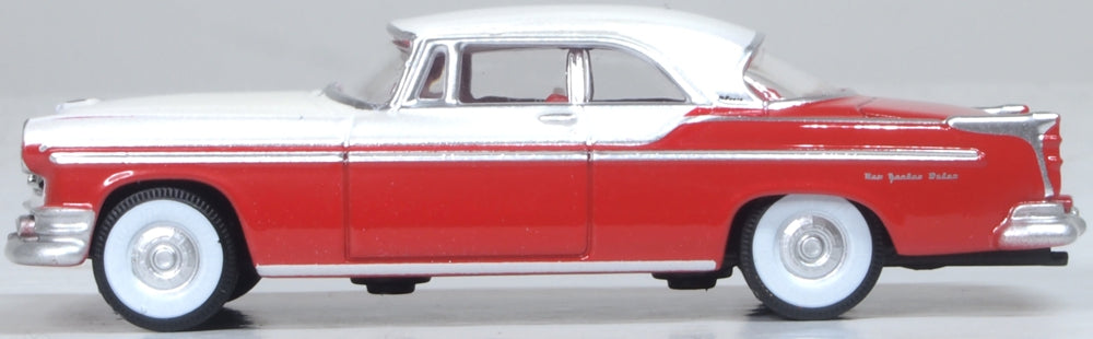 Model of the 1955 Chrysler New Yorker Deluxe Coupe St. Regis Tango Red/Platinum by Oxford at 1:87 scale.