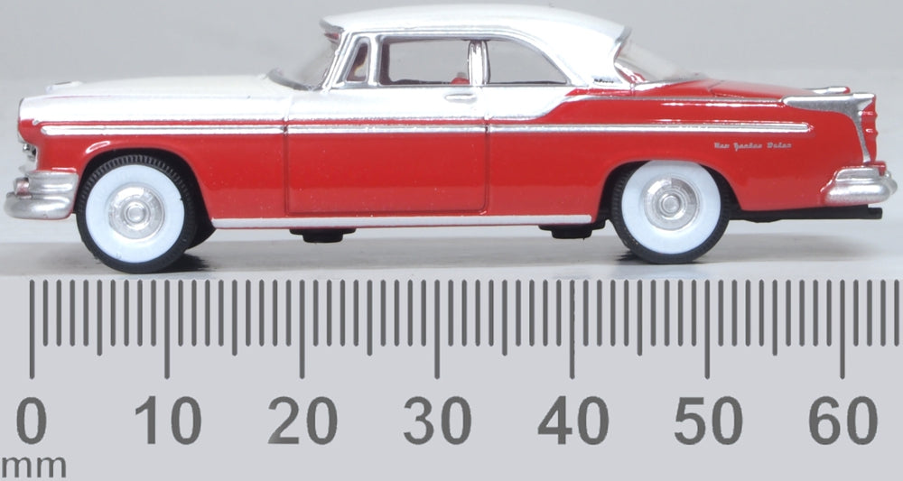 Model of the 1955 Chrysler New Yorker Deluxe Coupe St. Regis Tango Red/Platinum by Oxford at 1:87 scale.
